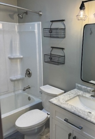 774 Considine Road Geneva, IL 60134 - Photo 13 of 43 a bathroom with a granite countertop sink toilet and shower