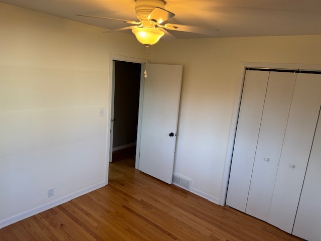 774 Considine Road Geneva, IL 60134 - Photo 20 of 43 a view of an empty room with wooden floor