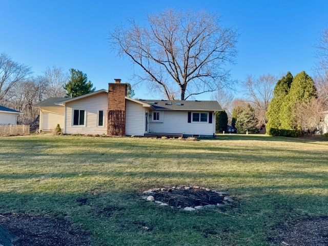 774 Considine Road Geneva, IL 60134 - Photo 42 of 43 a front view of a house with a garden