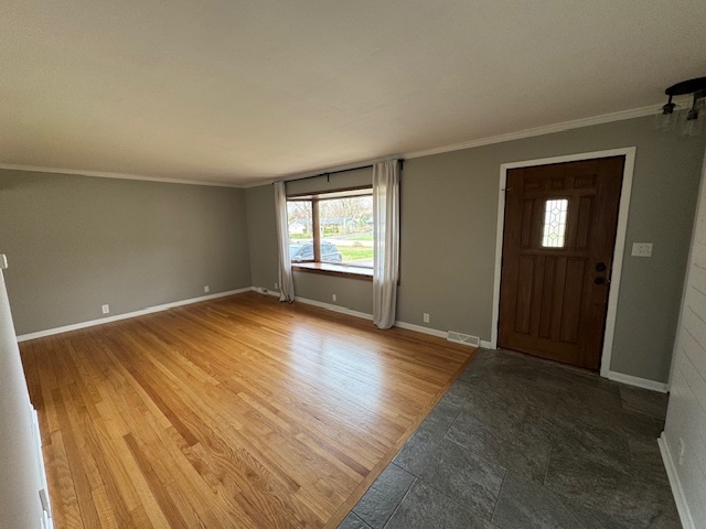 774 Considine Road Geneva, IL 60134 - Photo 6 of 43 an empty room with wooden floor and windows