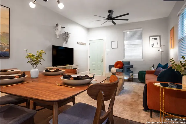 a view of a dining room with furniture