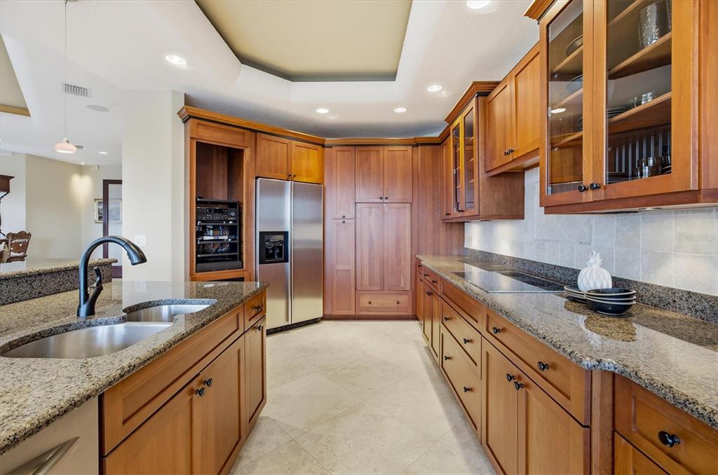 761 Norton Street Longboat Key, FL 34228 - Photo 40 of 66 a kitchen with granite countertop a sink and cabinets