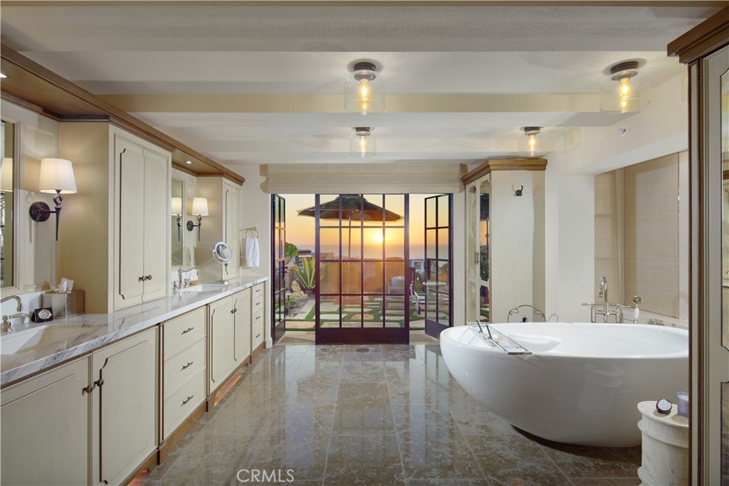 17 Pacific Ridge Place Dana Point, CA 92629 - Photo 17 of 46 a spacious bathroom with a large tub shower and sink