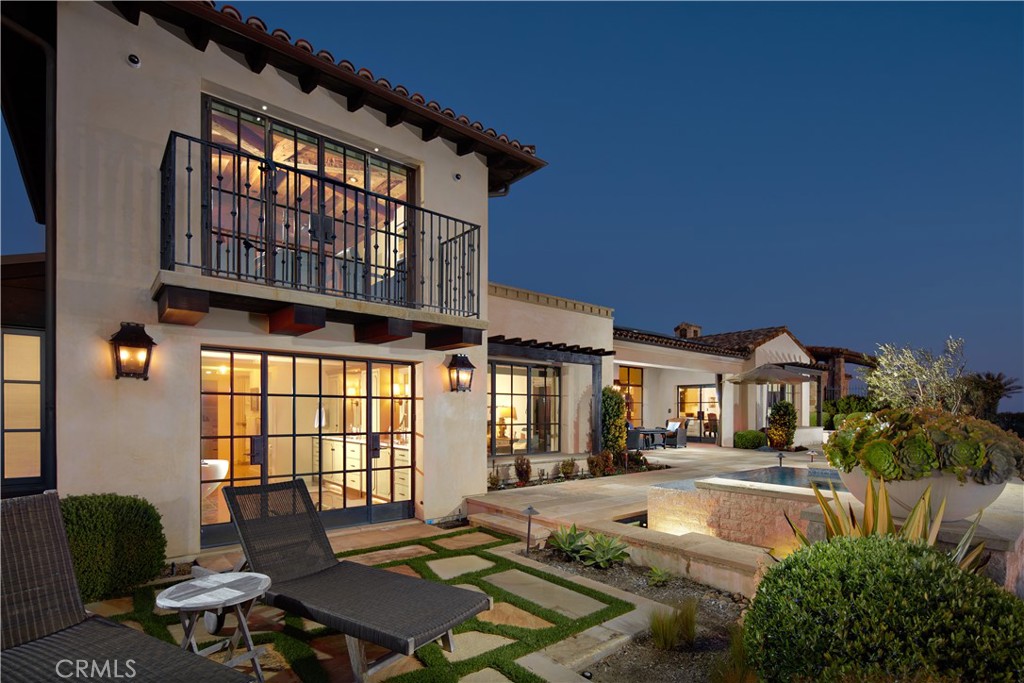 17 Pacific Ridge Place Dana Point, CA 92629 - Photo 20 of 46 a front view of a house with garden