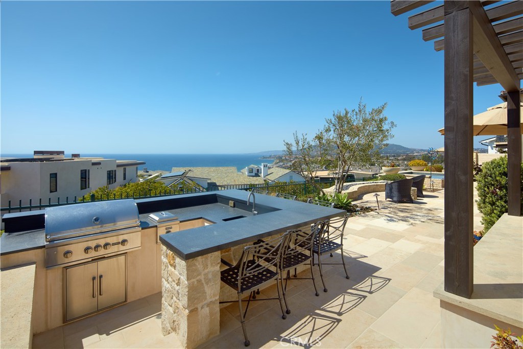 17 Pacific Ridge Place Dana Point, CA 92629 - Photo 23 of 46 a view of a terrace with furniture and stove