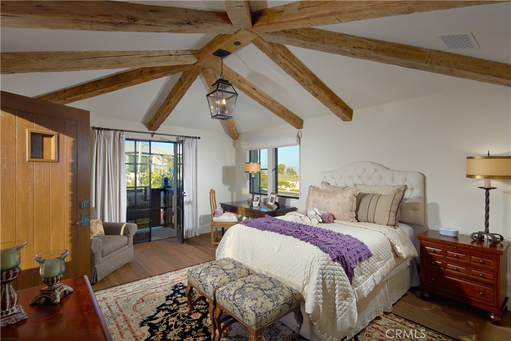 17 Pacific Ridge Place Dana Point, CA 92629 - Photo 35 of 46 a bed room with a bed and wooden floor