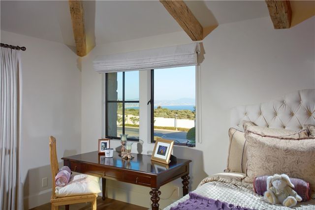 a utility room with cabinets washer and dryer