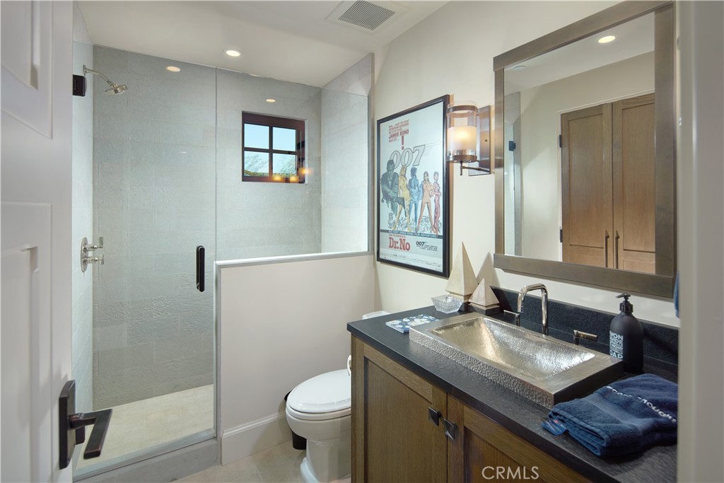 17 Pacific Ridge Place Dana Point, CA 92629 - Photo 41 of 46 a bathroom with a granite countertop sink toilet and shower