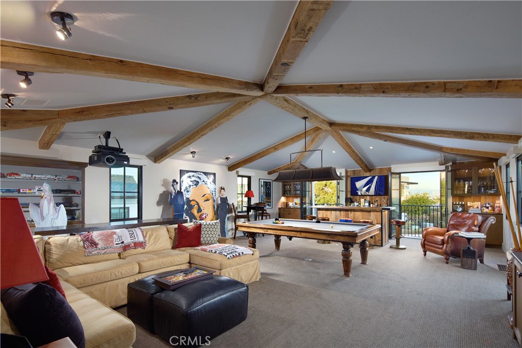 17 Pacific Ridge Place Dana Point, CA 92629 - Photo 42 of 46 a living room with furniture a table and chairs