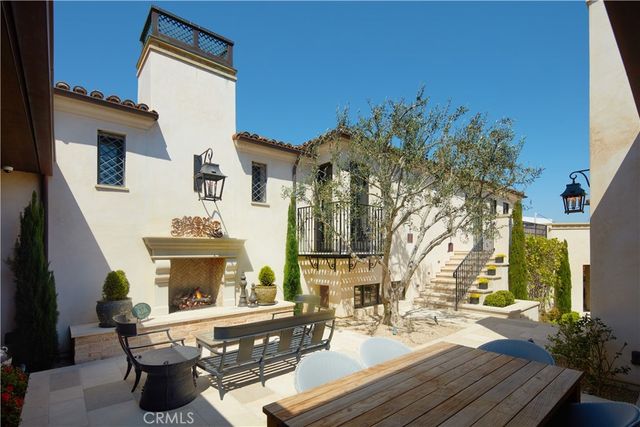 a view of a house with patio outdoor kitchen