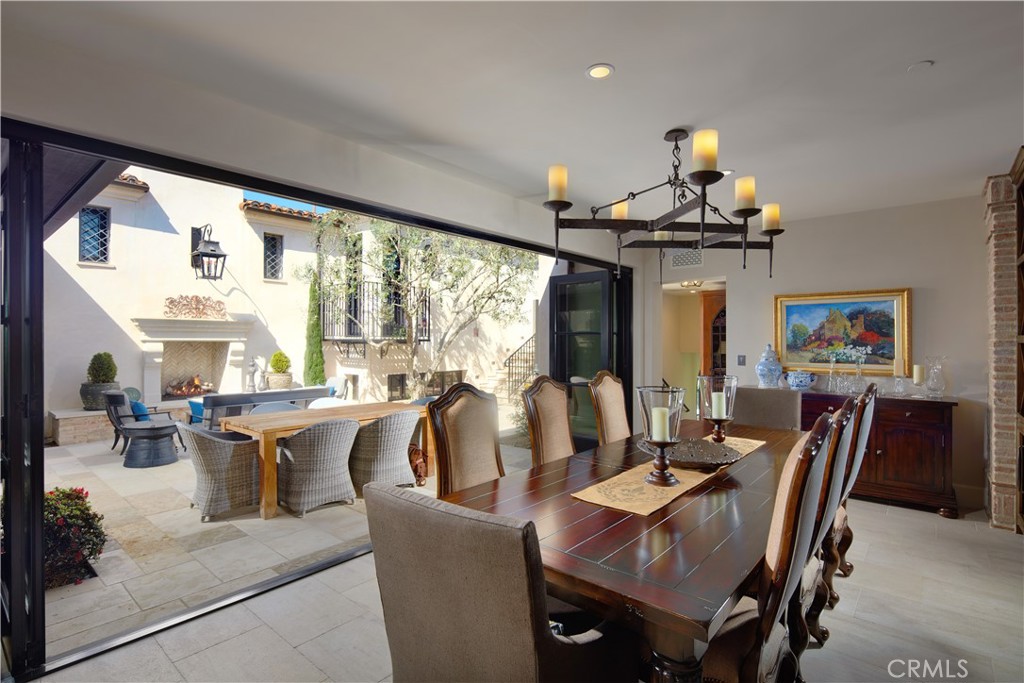 17 Pacific Ridge Place Dana Point, CA 92629 - Photo 8 of 46 a view of a dining room with furniture large windows and wooden floor