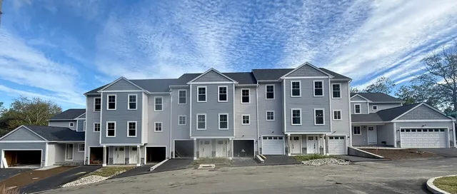 a front view of a large white building