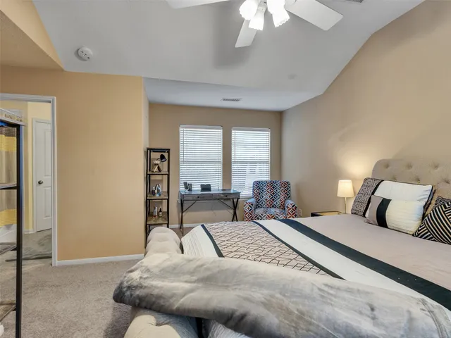 a view of a bathroom with two sinks a mirror and a shower