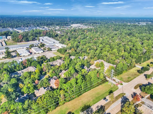 a view of a yard and car park