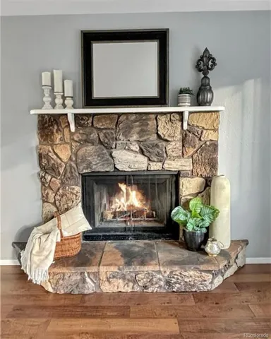 a living room with a fireplace