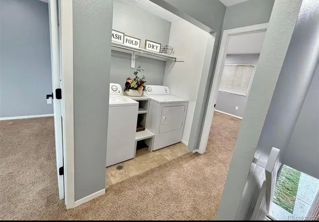 view of hall way with mirror