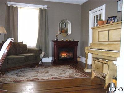336 First Street Slatington, PA 18080 - Photo 8 of 16 Front Parlor w/vent-less propane fireplace