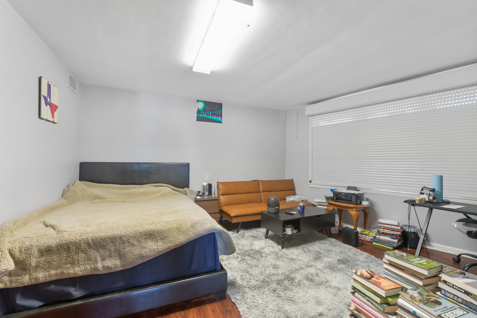 7124 West Higgins Avenue Chicago, IL 60656 - Photo 14 of 33 a bedroom with a bed and a table in it