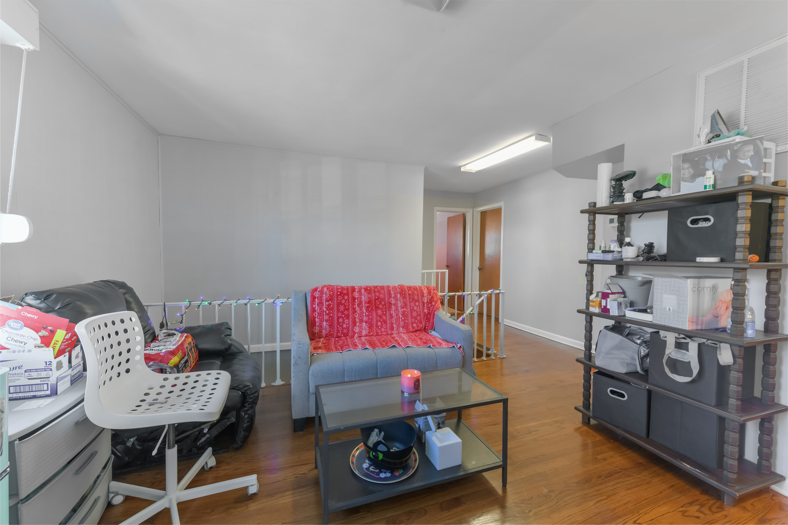 7124 West Higgins Avenue Chicago, IL 60656 - Photo 16 of 33 a living room with furniture and a flat screen tv
