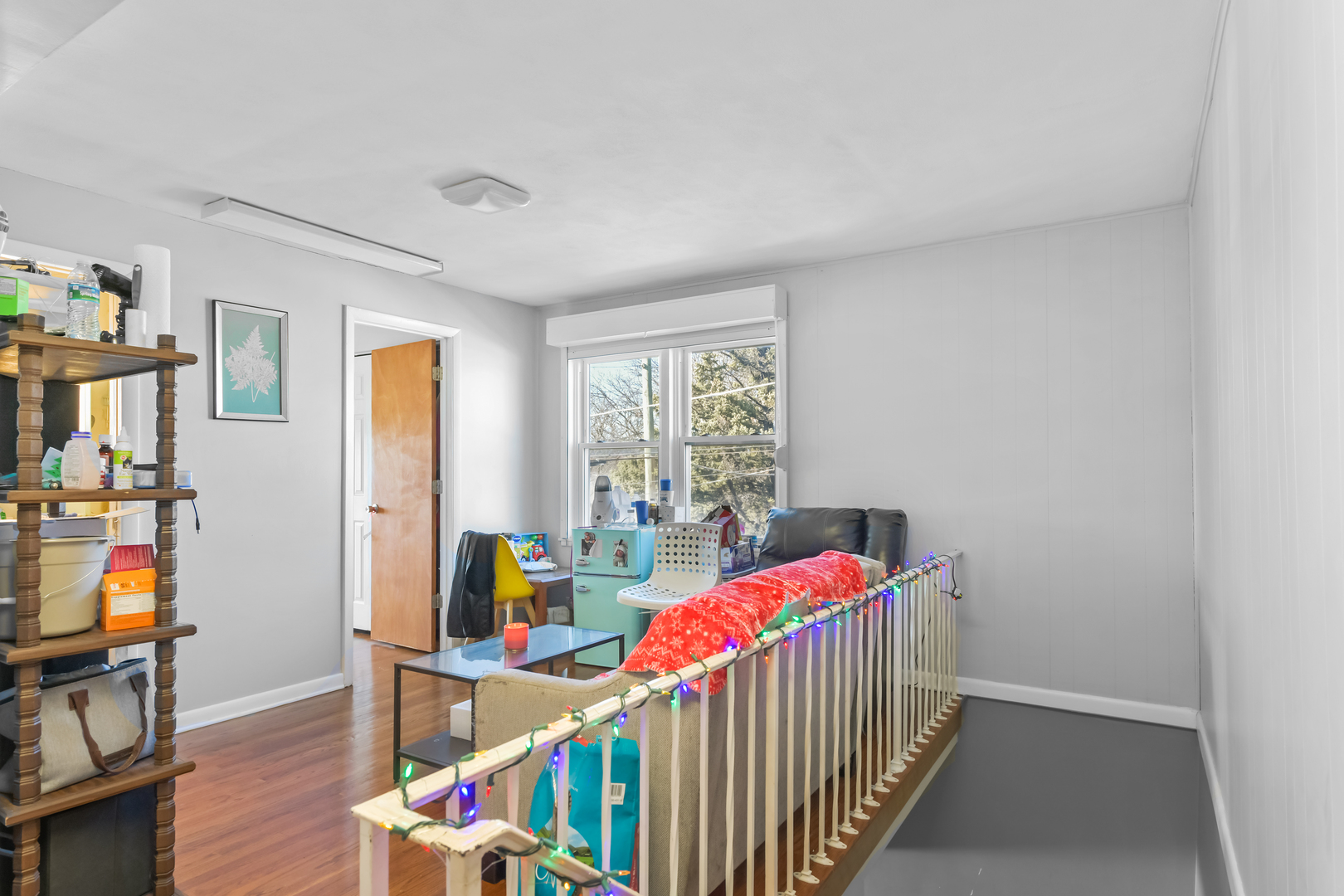 7124 West Higgins Avenue Chicago, IL 60656 - Photo 18 of 33 a kids bedroom with a bed and wooden floor
