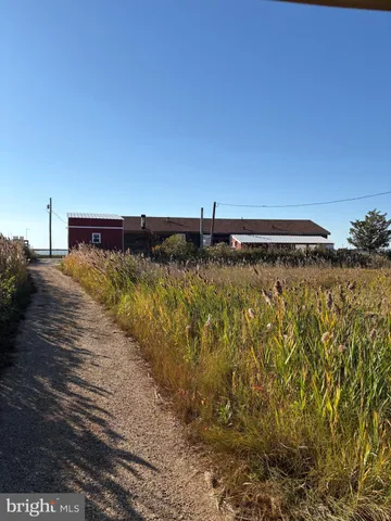 a view of balcony with wooden floor