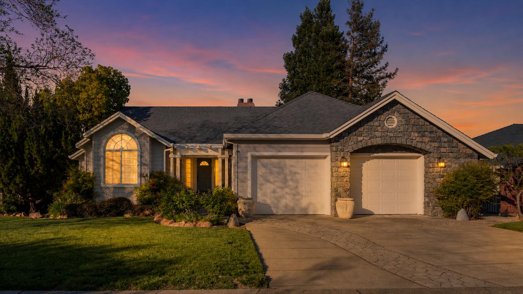 3126 Riesling Path Redding, CA 96001 - Photo 32 of 32 a front view of a house with a yard and garage