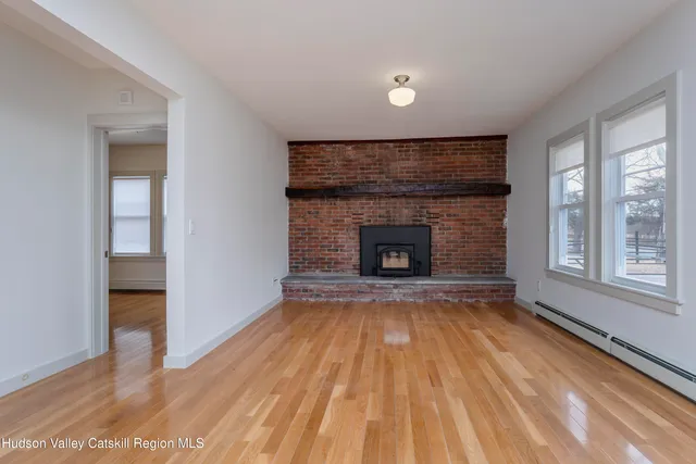 a kitchen with granite countertop a stove and a sink