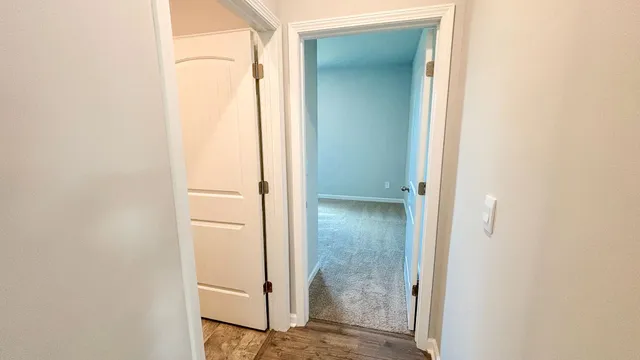 view of a bathroom with a glass door