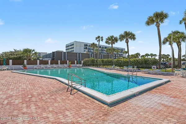 a view of a swimming pool and a terrace