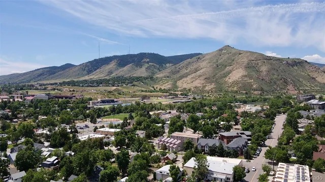 a sign on the side of a tree