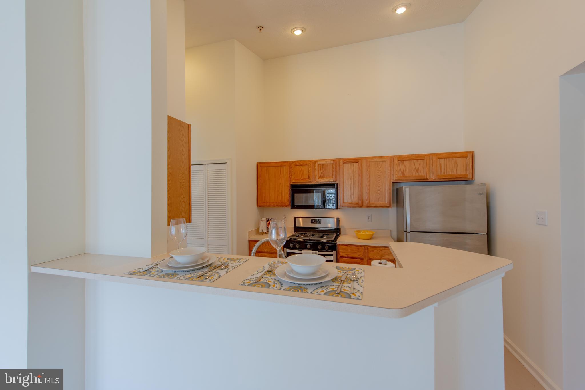 9766 Reese Farm Road Owings Mills, MD 21117 - Photo 9 of 30 Kitchen With Breakfast Bar
