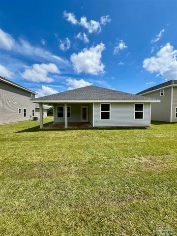 a front view of house with yard