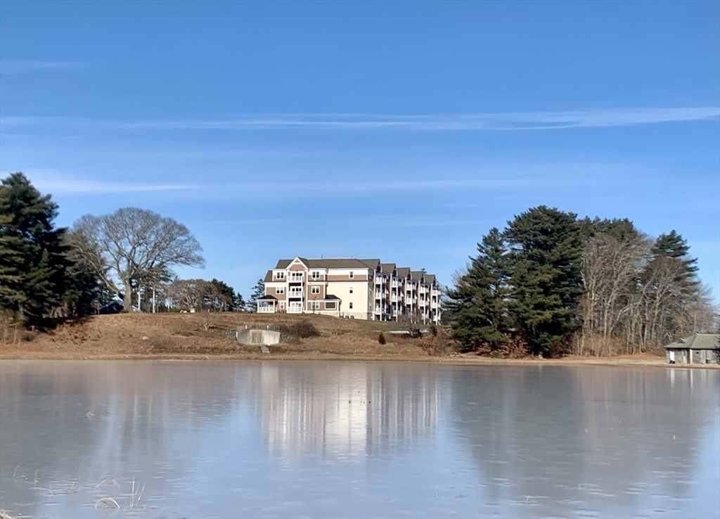 57 Long Point Road, Unit 104 Lakeville, MA 02347 - Photo 4 of 41 a view of ocean view with beach