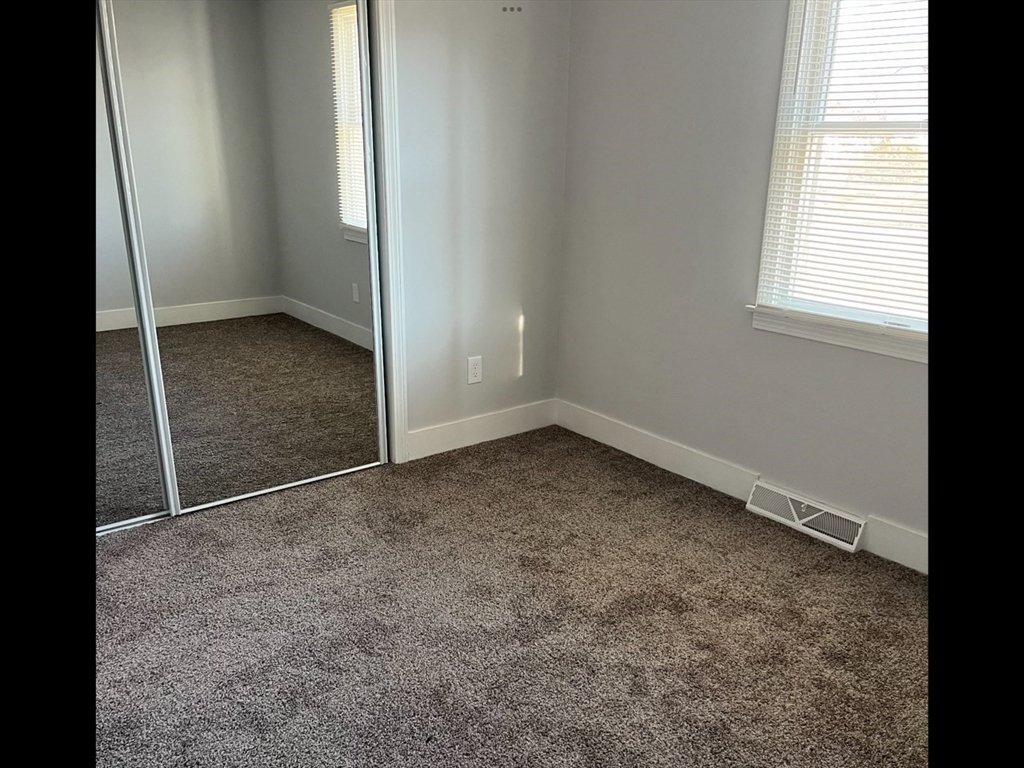 138 Jeffrey Road Springfield, MA 01119 - Photo 16 of 22 an empty room with windows