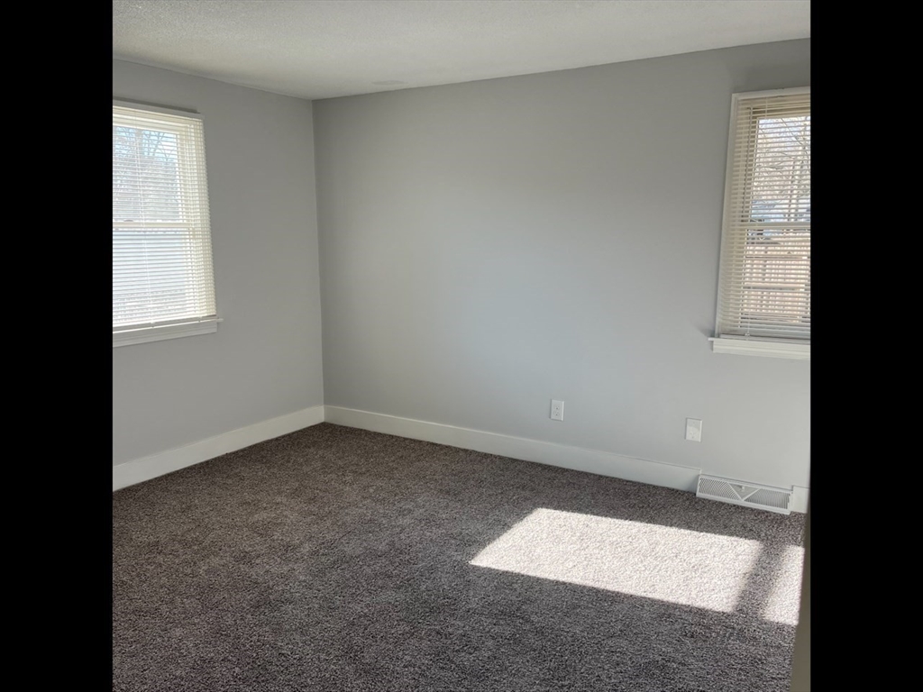 138 Jeffrey Road Springfield, MA 01119 - Photo 17 of 22 an empty room with a window