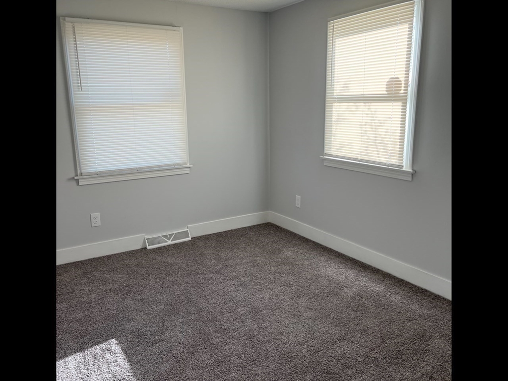 138 Jeffrey Road Springfield, MA 01119 - Photo 19 of 22 an empty room with a window