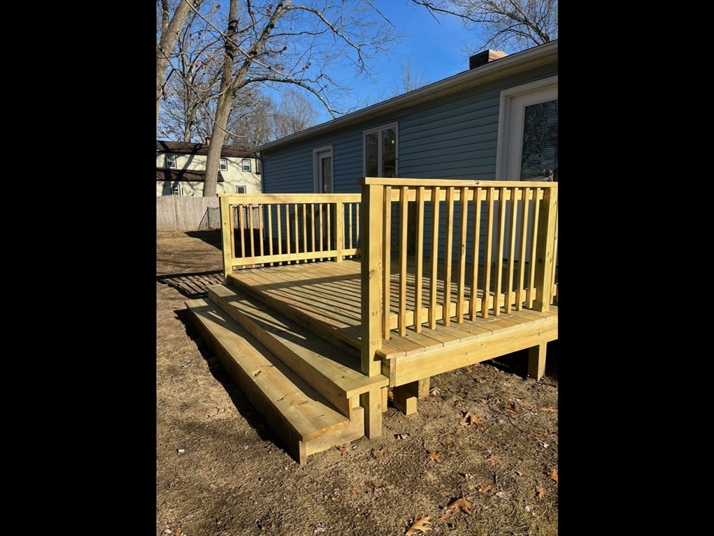 138 Jeffrey Road Springfield, MA 01119 - Photo 5 of 22 a view of backyard with deck and wooden floor