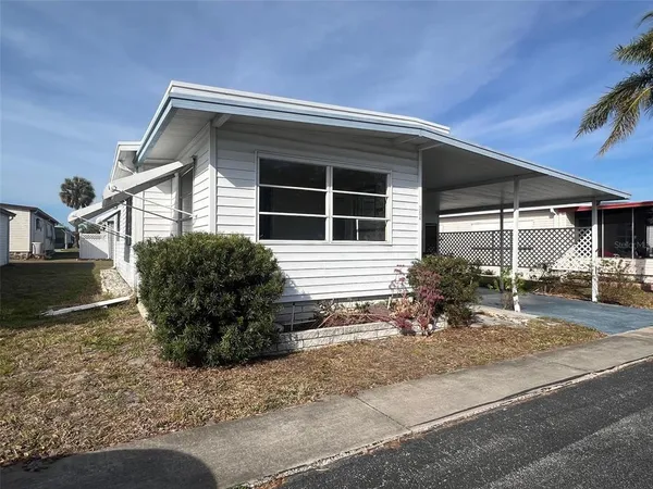 a view of a house with a patio