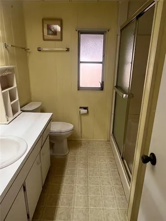 a bathroom with a sink and a toilet