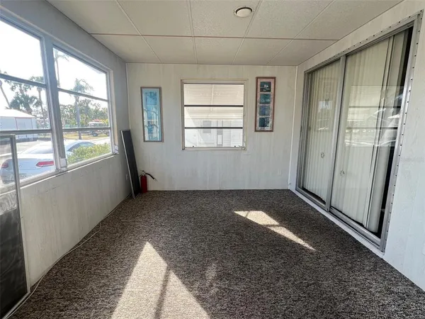 a view of an empty room and window