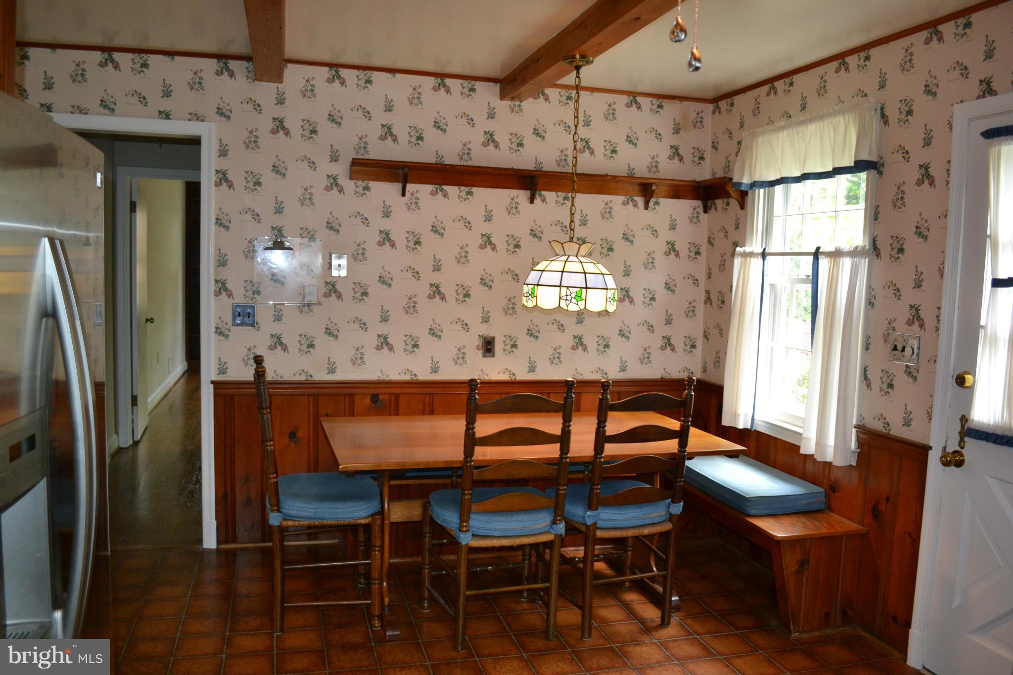 7911 Springway Road Baltimore, MD 21204 - Photo 8 of 30 a view of a dining room with furniture