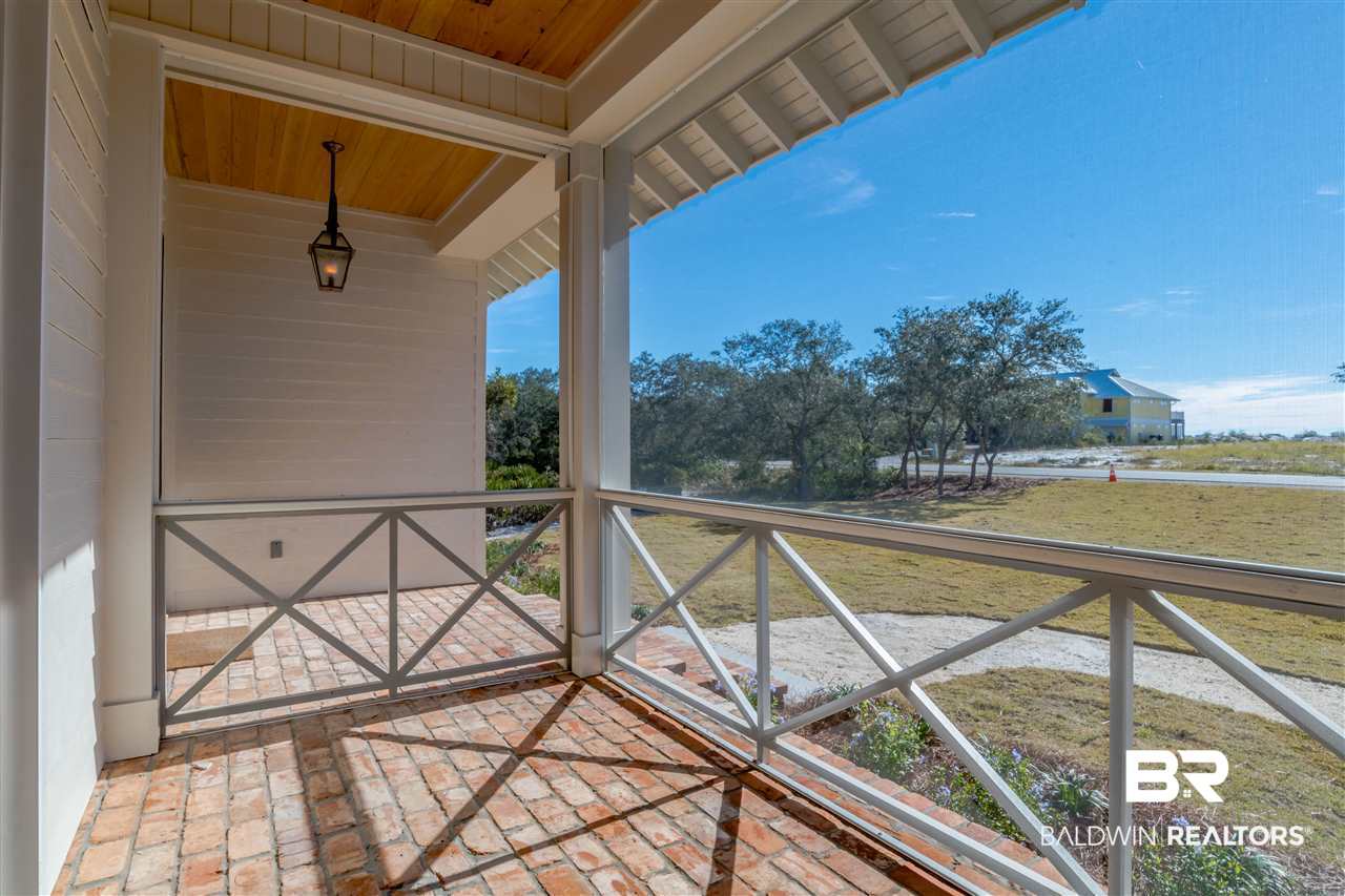 32090 River Cove Orange Beach, AL 36561 - Photo 5 of 28 Cypress ceiling, brick flooring