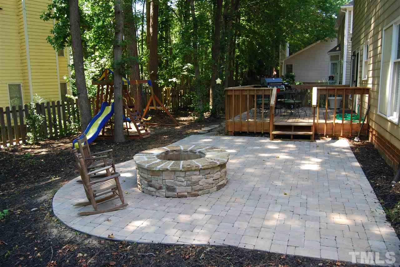 12301 Inglehurst Drive Raleigh, NC 27613 - Photo 20 of 23 a view of a house with backyard