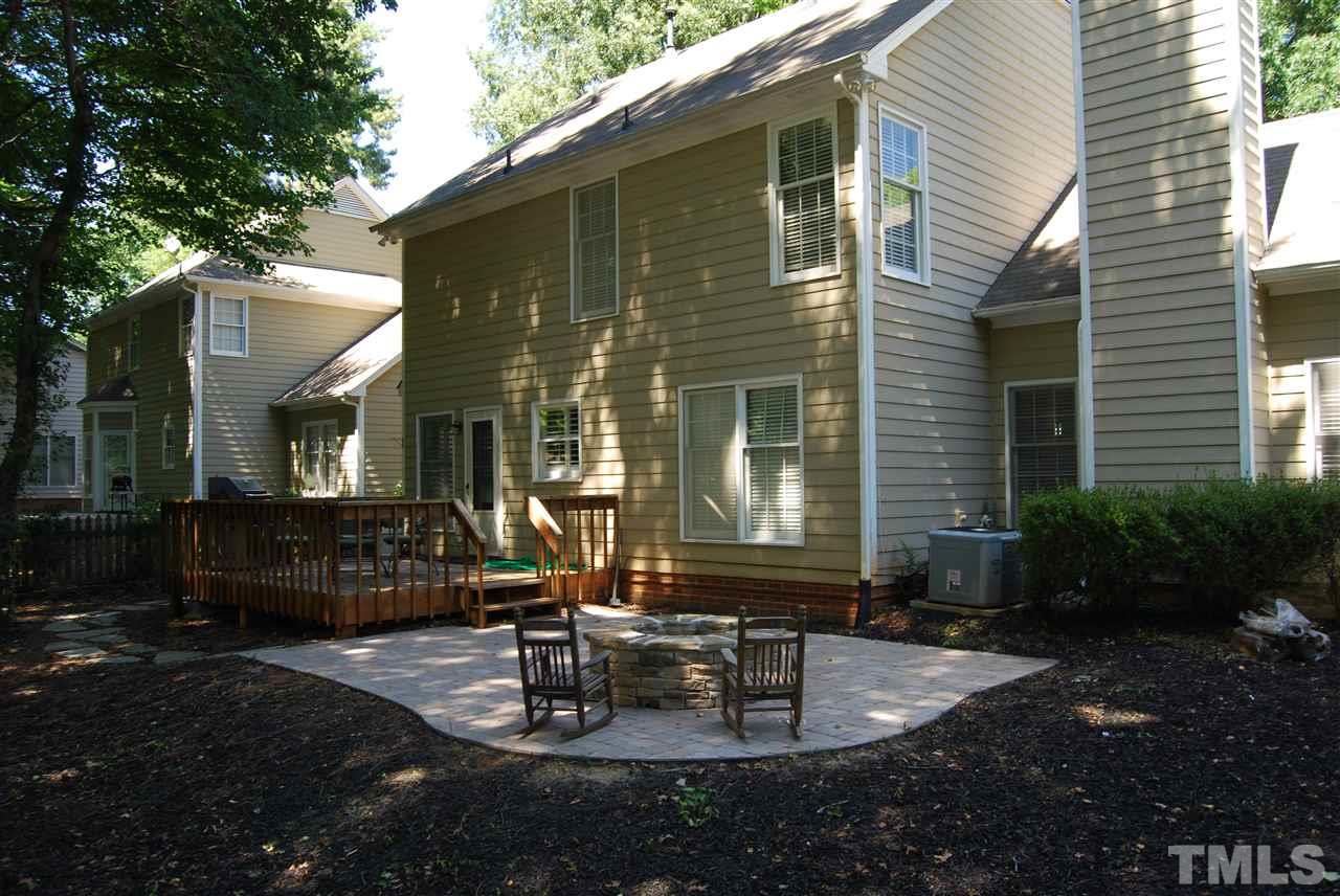 12301 Inglehurst Drive Raleigh, NC 27613 - Photo 22 of 23 a front view of a house with patio