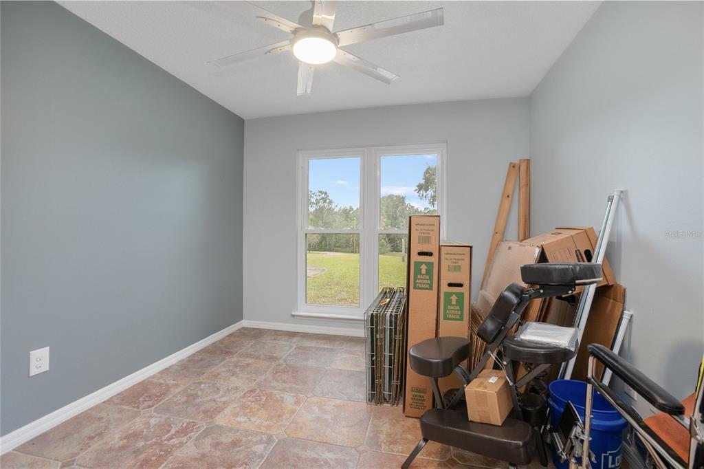 378 Glenwood Road DeLand, FL 32720 - Photo 18 of 38 a view of a room with gym equipment