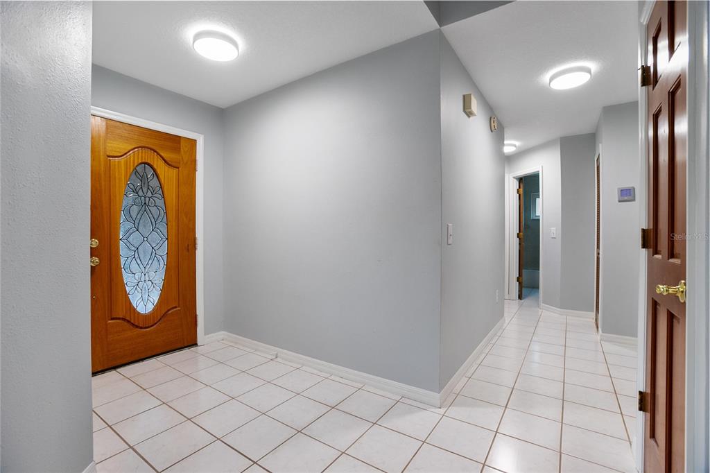 378 Glenwood Road DeLand, FL 32720 - Photo 5 of 38 a view of a hallway with entryway