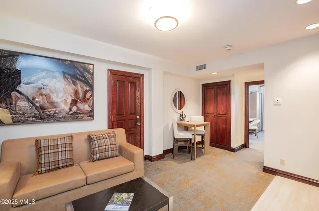 a living room with furniture and window