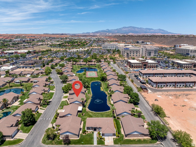 805 South River Road, Unit 70 St. George, UT 84790 - Photo 36 of 38 Aerial view showcasing the property within a community featuring multiple ponds with fountains