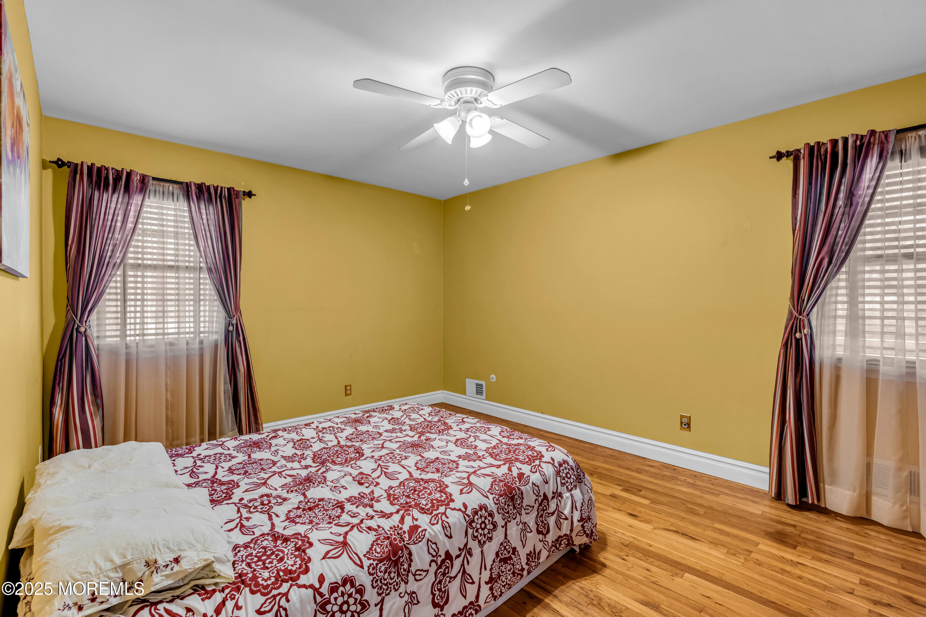 12 Windsor Road Howell, NJ 07731 - Photo 16 of 56 a bedroom with a bed and a window
