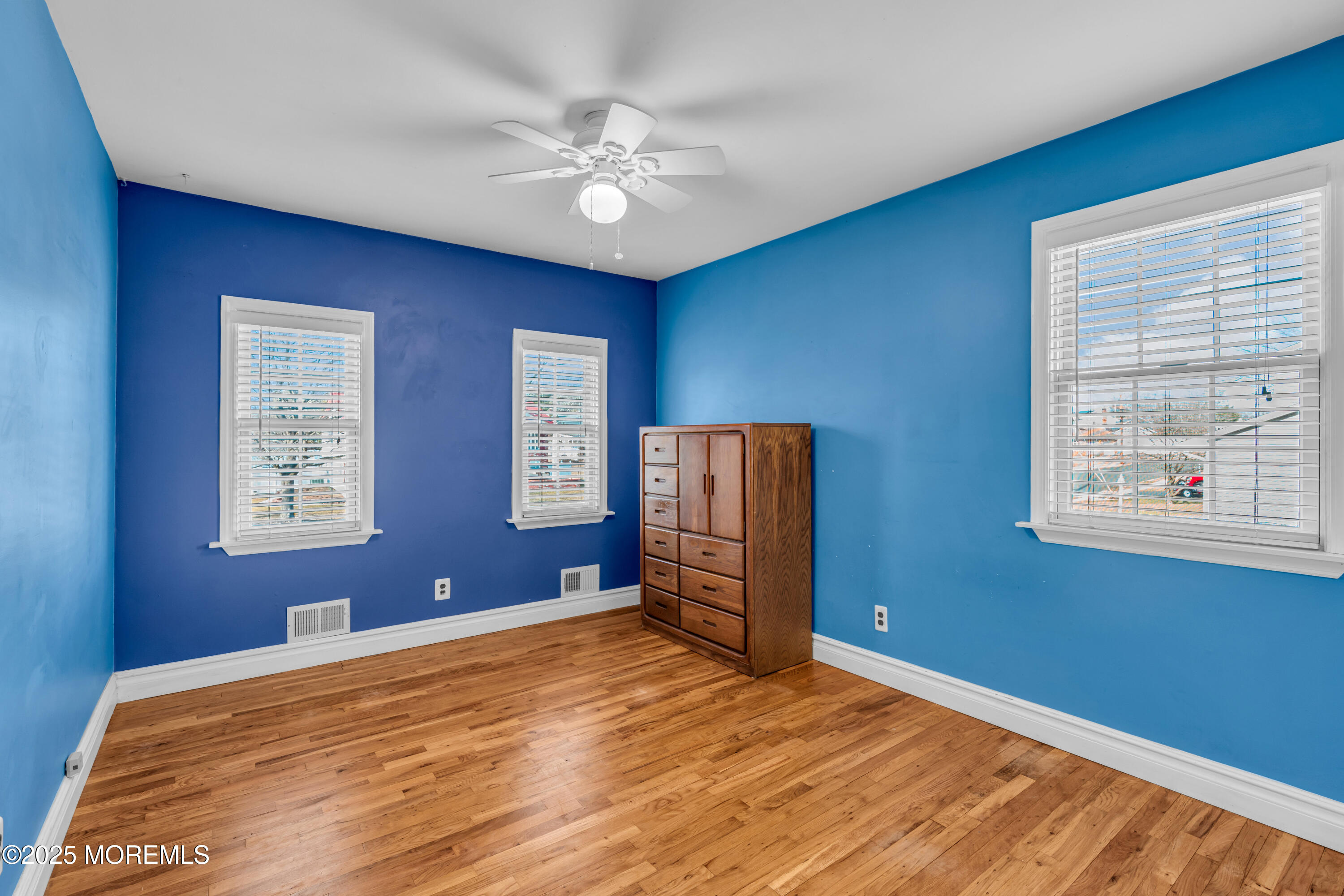 12 Windsor Road Howell, NJ 07731 - Photo 19 of 56 a view of an empty room with a window